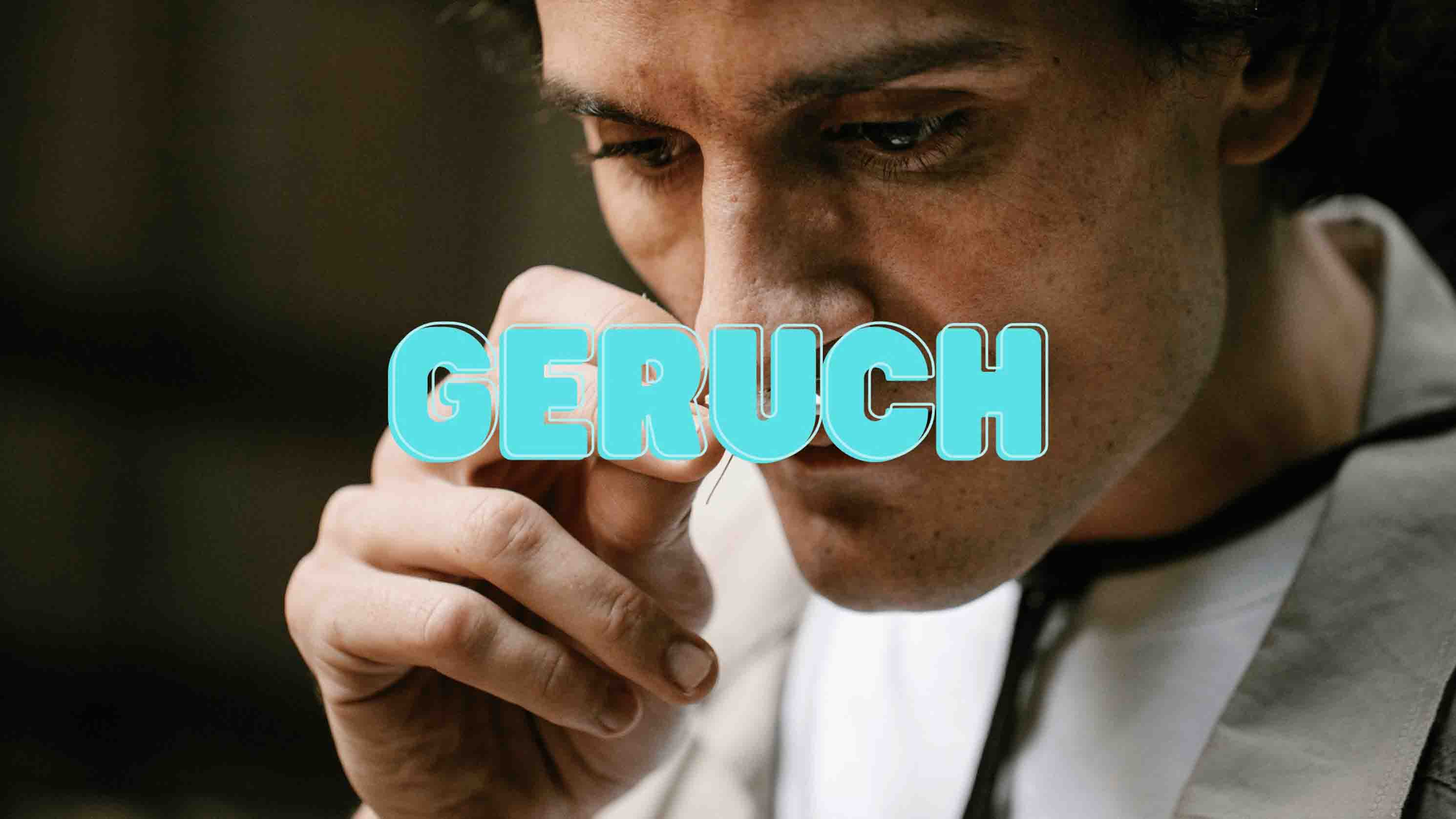 Ein Mann der an etwas riecht mit der Überschrift "Geruch"